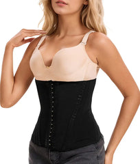 Woman wearing a black waist trainer over a beige top on a white background