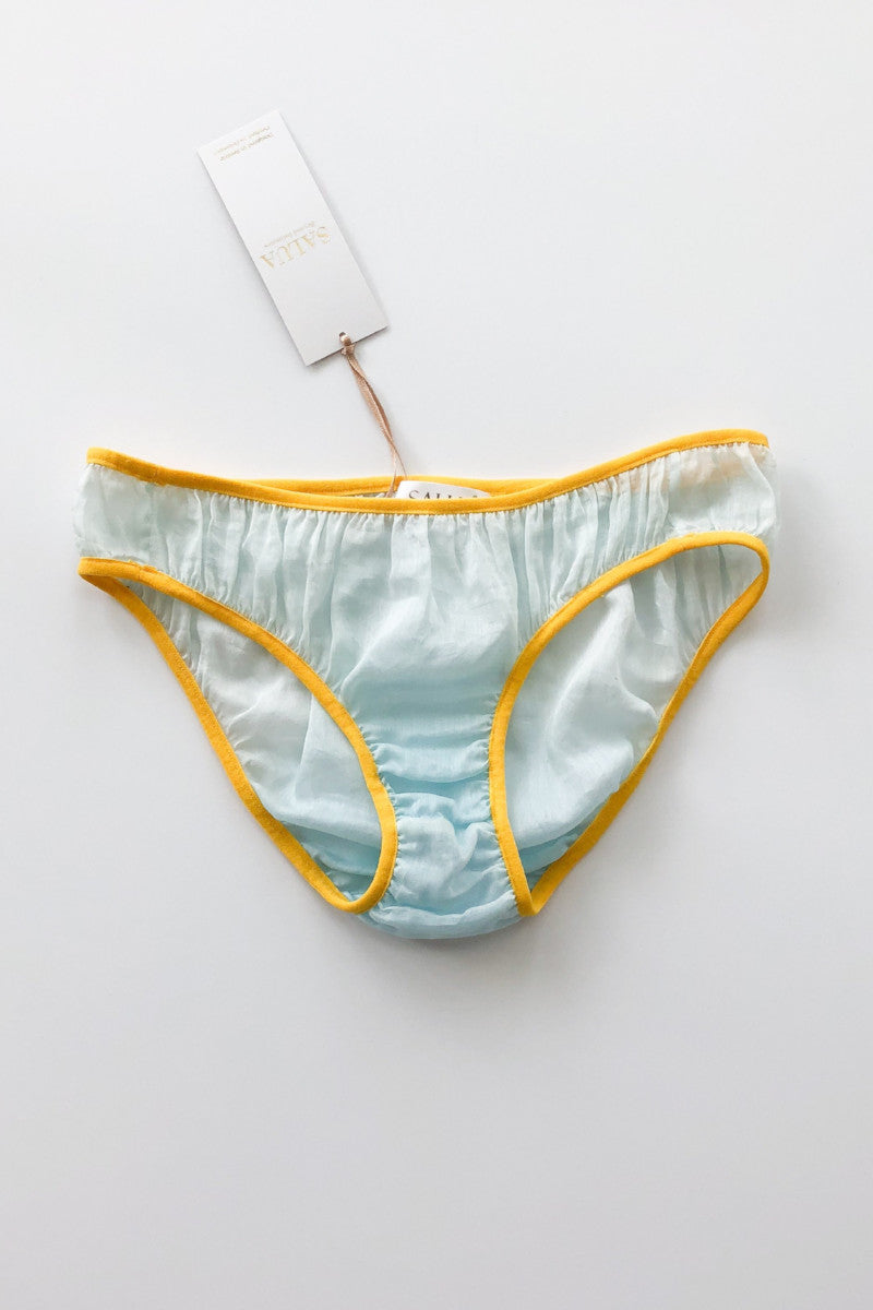 Light blue underwear with yellow trim on a white background