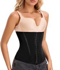 Woman wearing a black waist trainer over a beige tank top on a white background