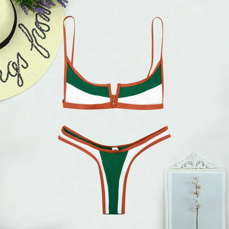 Green and orange bikini set on a white background with decorative elements.