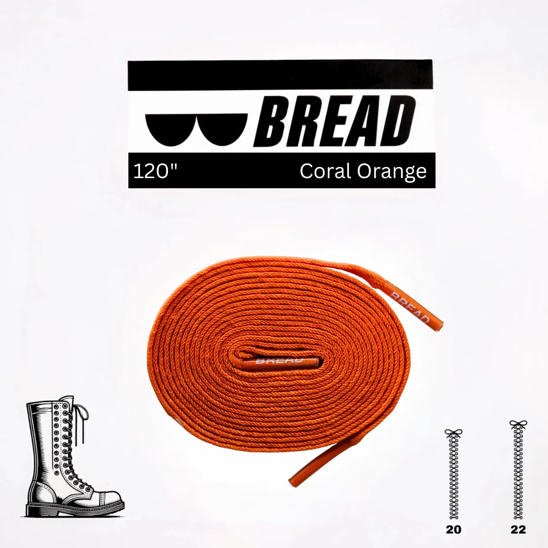 Orange shoelaces with 'BREAD' branding on a white background