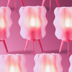 Pink and white textured lamps on a pink background