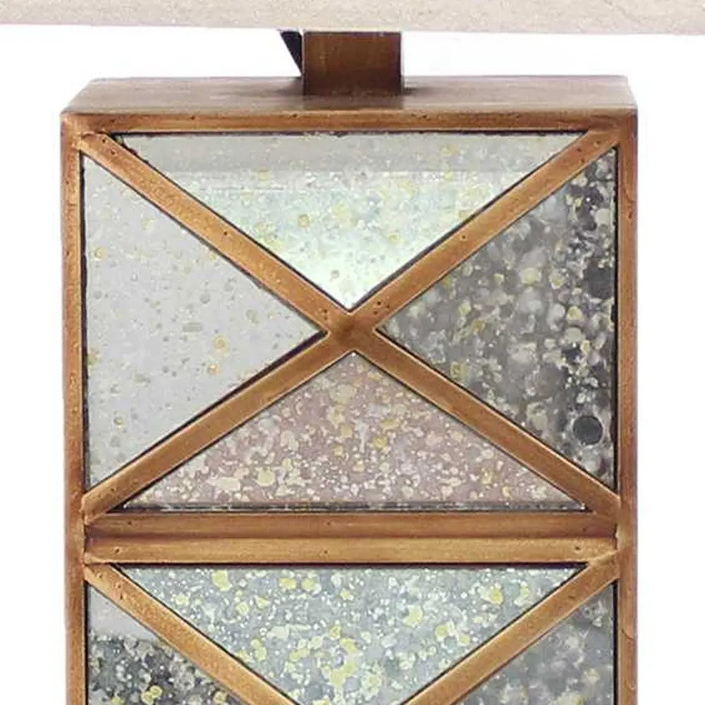 Gold table lamp with the illusion of a mirror base HomeRoots