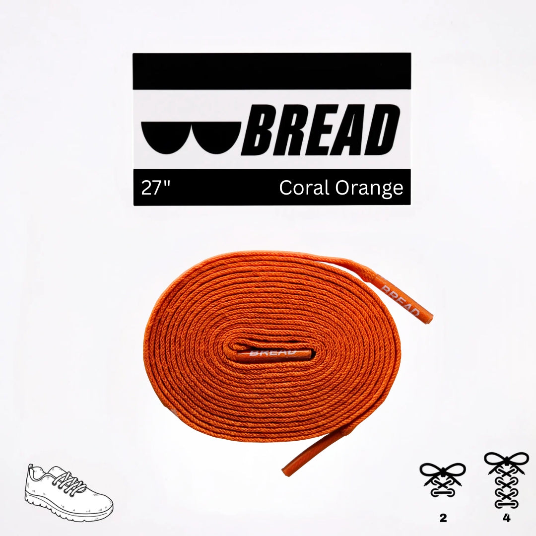 Orange shoelace with 'BREAD' branding on a white background