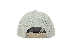 Beige baseball cap with a textured pattern on a white background