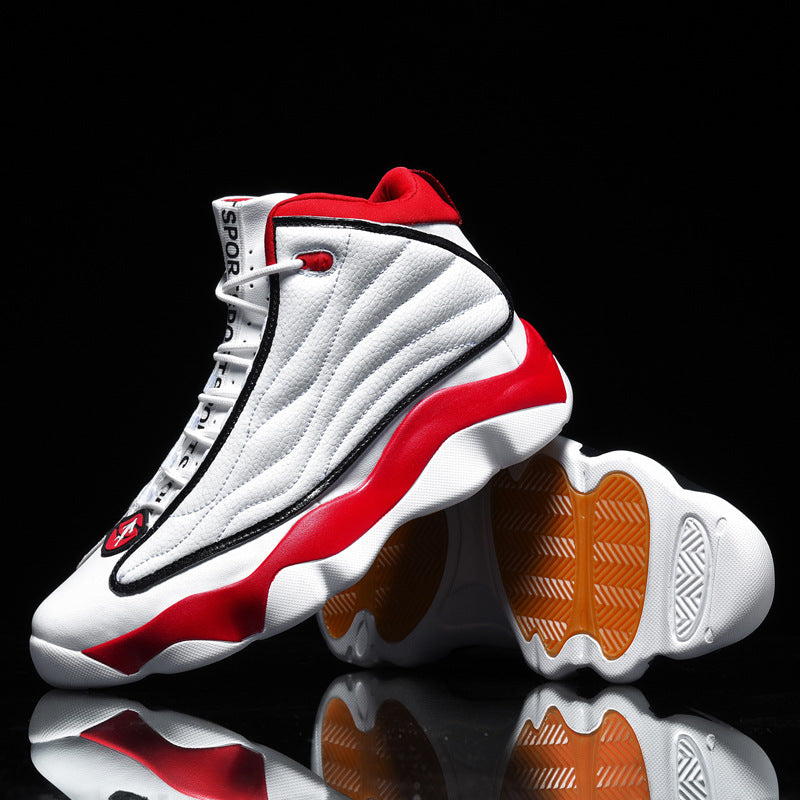 White and red high-top sneakers with orange soles on a black background