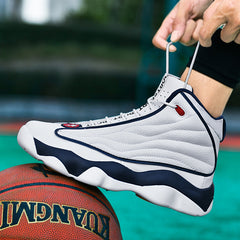 White high-top sneaker with blue accents being worn on a basketball court