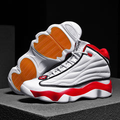 White sneakers with red and orange accents on a dark background