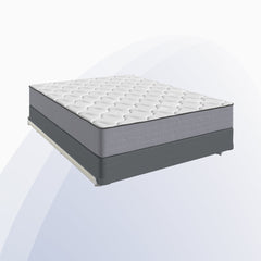 Mattress on a clear stand against a white background