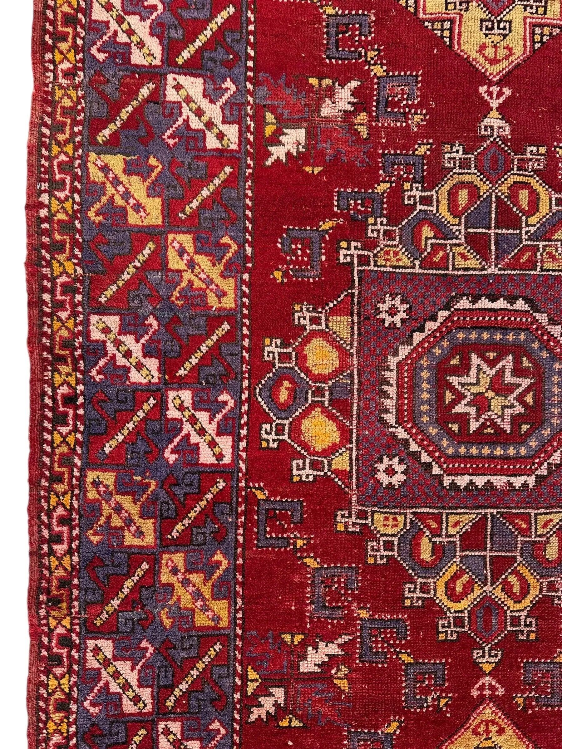 Dezgiri Anatolian Tribal Wool Rug – 5’x8’– Hand-Knotted Red Medallion Rug with Geometric Motifs Rugistan