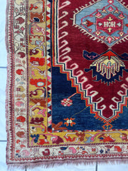 Hand-Knotted Antique Turkish Melas Wool Rug – 4'3" x 5'11" – Vibrant Geometric Motifs Rugistan