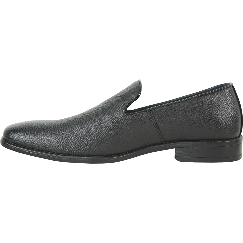 Black slip-on shoe on a white background
