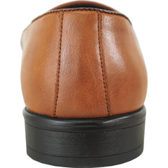 Close-up of a brown leather shoe with a black sole on a white background