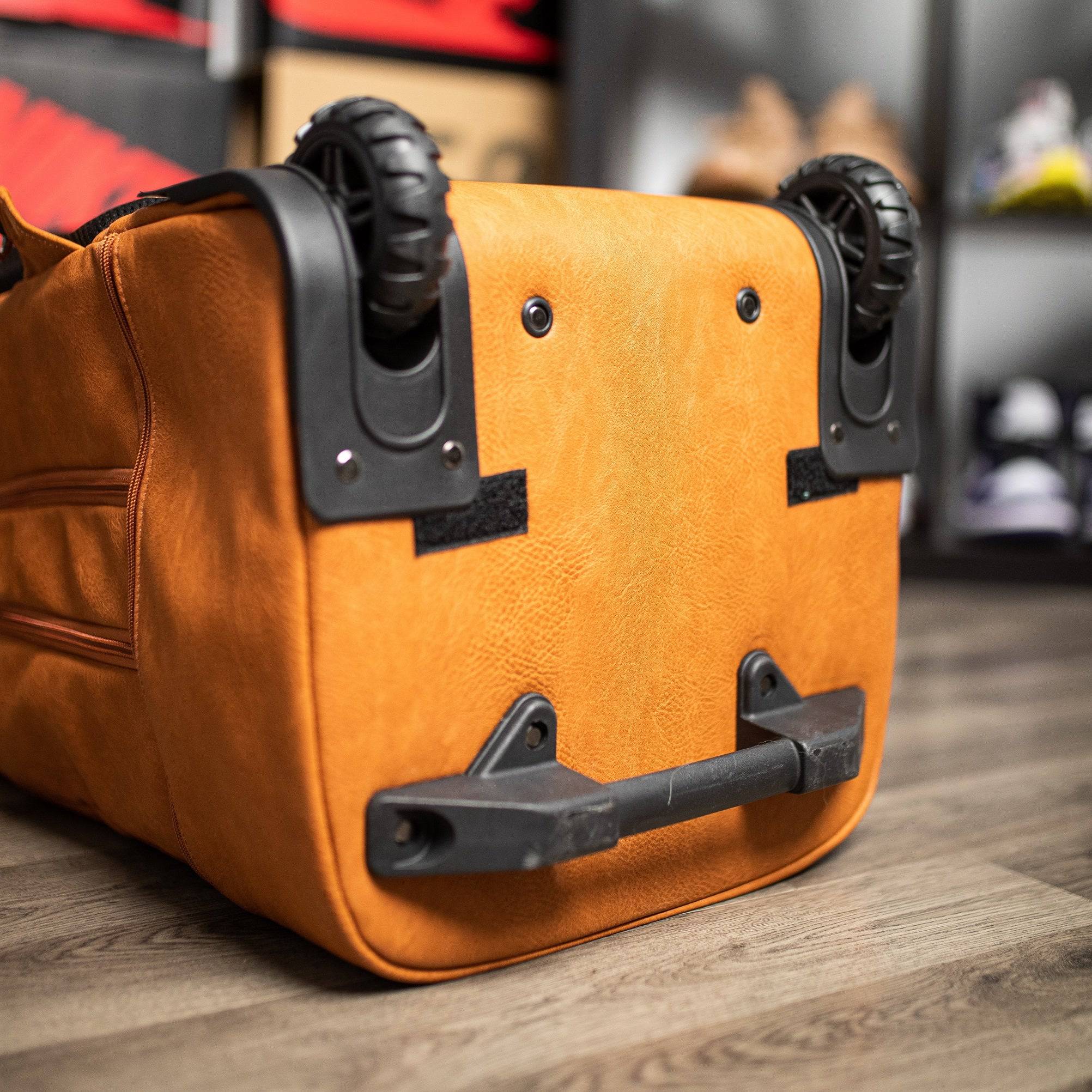 Brown Leather Carry-On Patented Roller Bag Sole Premise