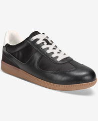 Black leather sneaker with white laces and brown sole on a white background