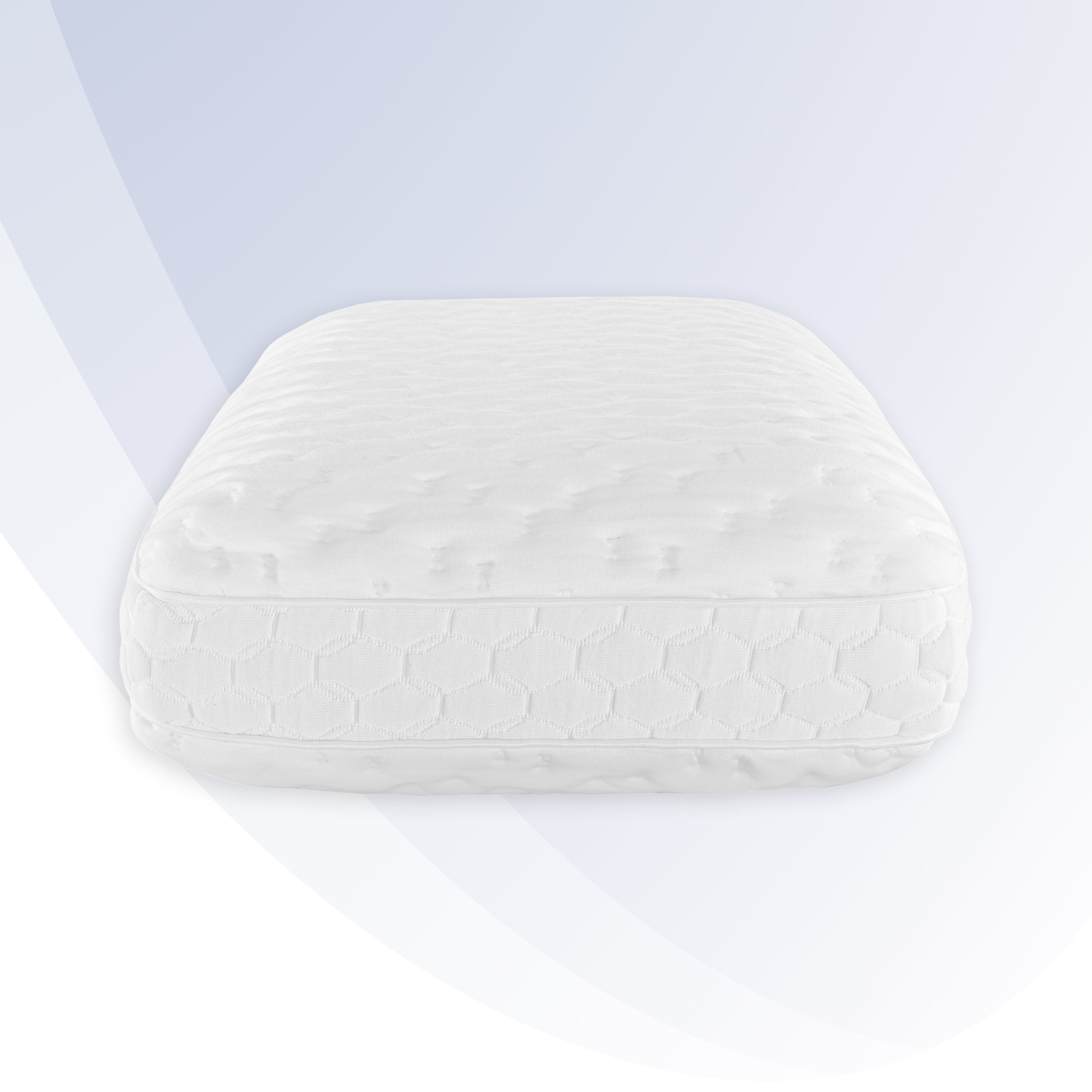 White textured pillow on a light gray background