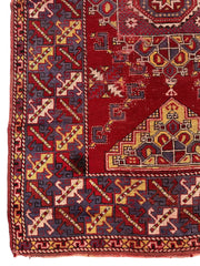 Dezgiri Anatolian Tribal Wool Rug – 5’x8’– Hand-Knotted Red Medallion Rug with Geometric Motifs Rugistan