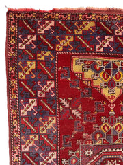 Dezgiri Anatolian Tribal Wool Rug – 5’x8’– Hand-Knotted Red Medallion Rug with Geometric Motifs Rugistan