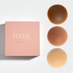Three cosmetic sponges with a 'BARE by Revlon' box on a light background