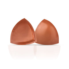 Pair of brown silicone bra cups on a white background