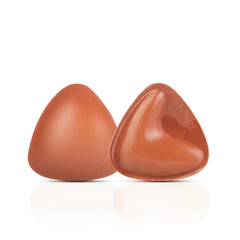 Two brown, teardrop-shaped objects on a white background
