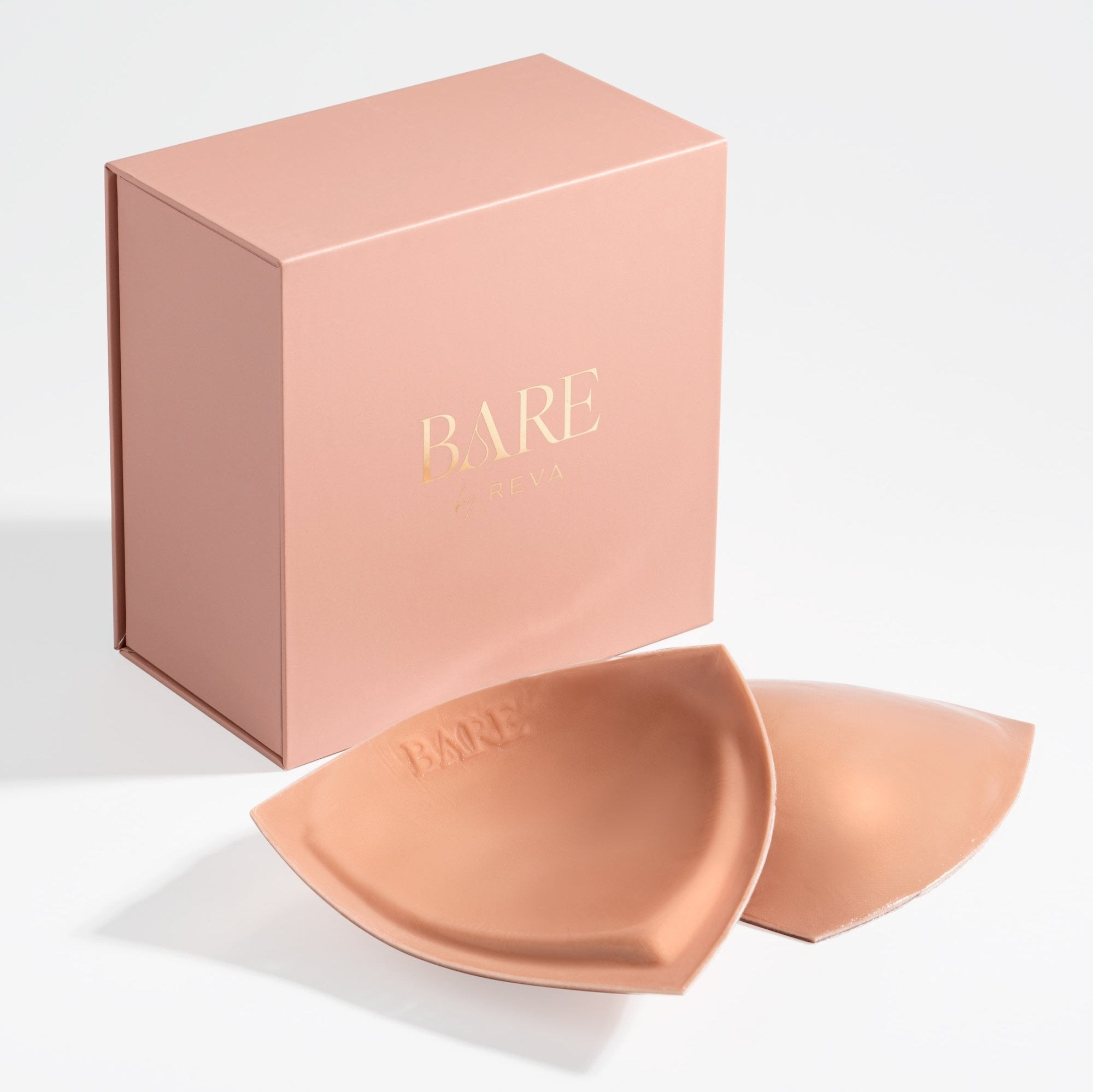 Bare brand silicone pads with packaging on a light gray background