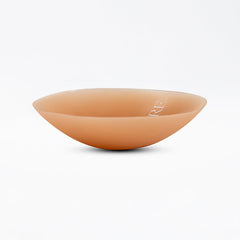 Ceramic bowl with a smooth, curved design on a white background
