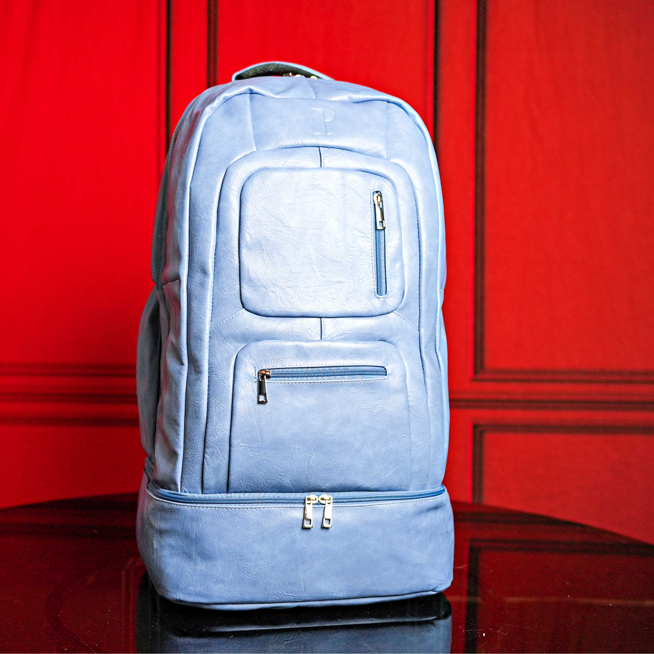 Baby Blue Leather Patented Carry-On Backpack Sole Premise