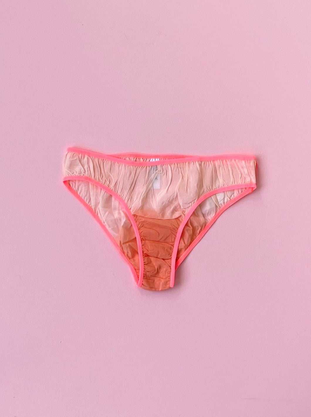 Pink thong on a pink background