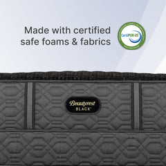 Gray mattress with Beautyrest Black logo and CertiPUR-US certification label on a light gray background