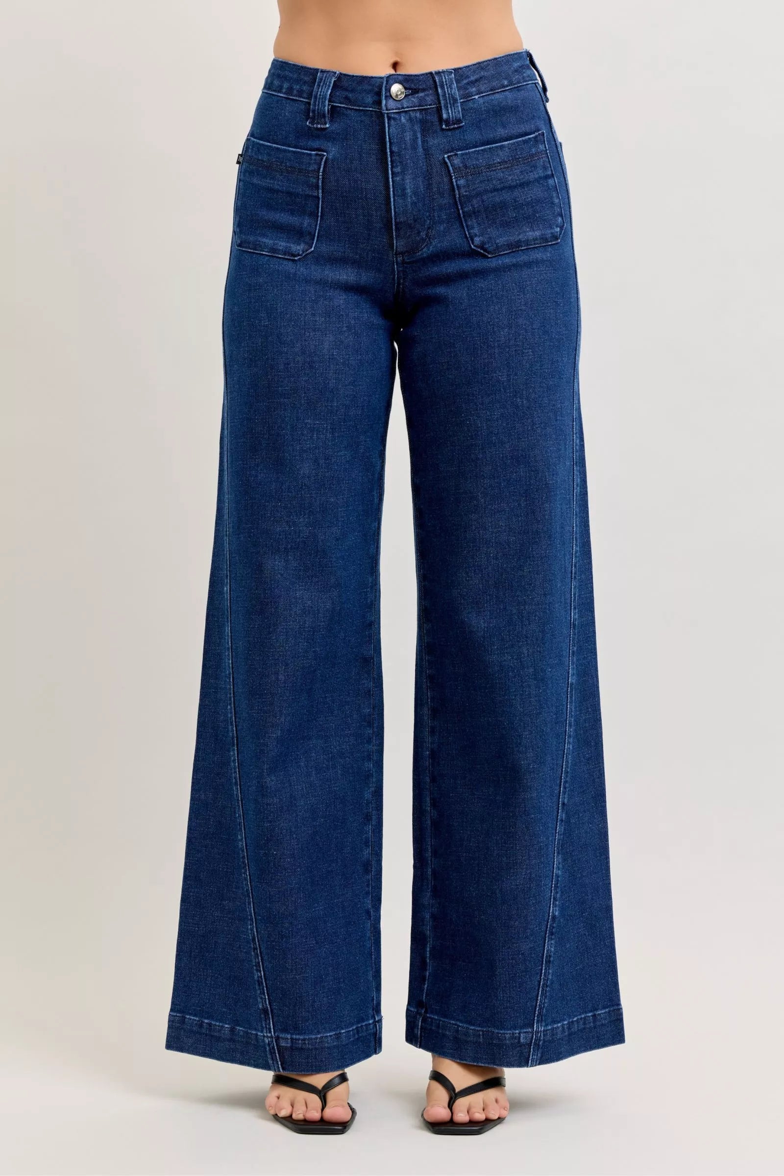 Blue jeans on a plain background