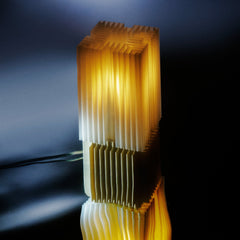 Modern lamp with geometric design on a reflective surface