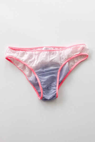 Pink-trimmed underwear on a light gray background