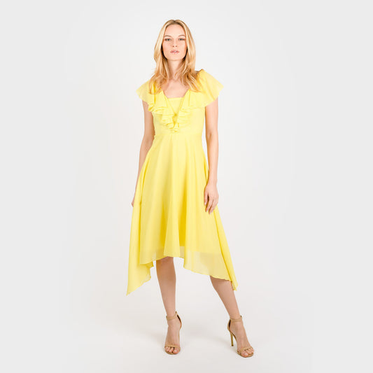 Woman wearing a yellow dress on a white background