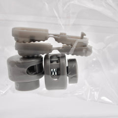 Gray plastic components on a white background
