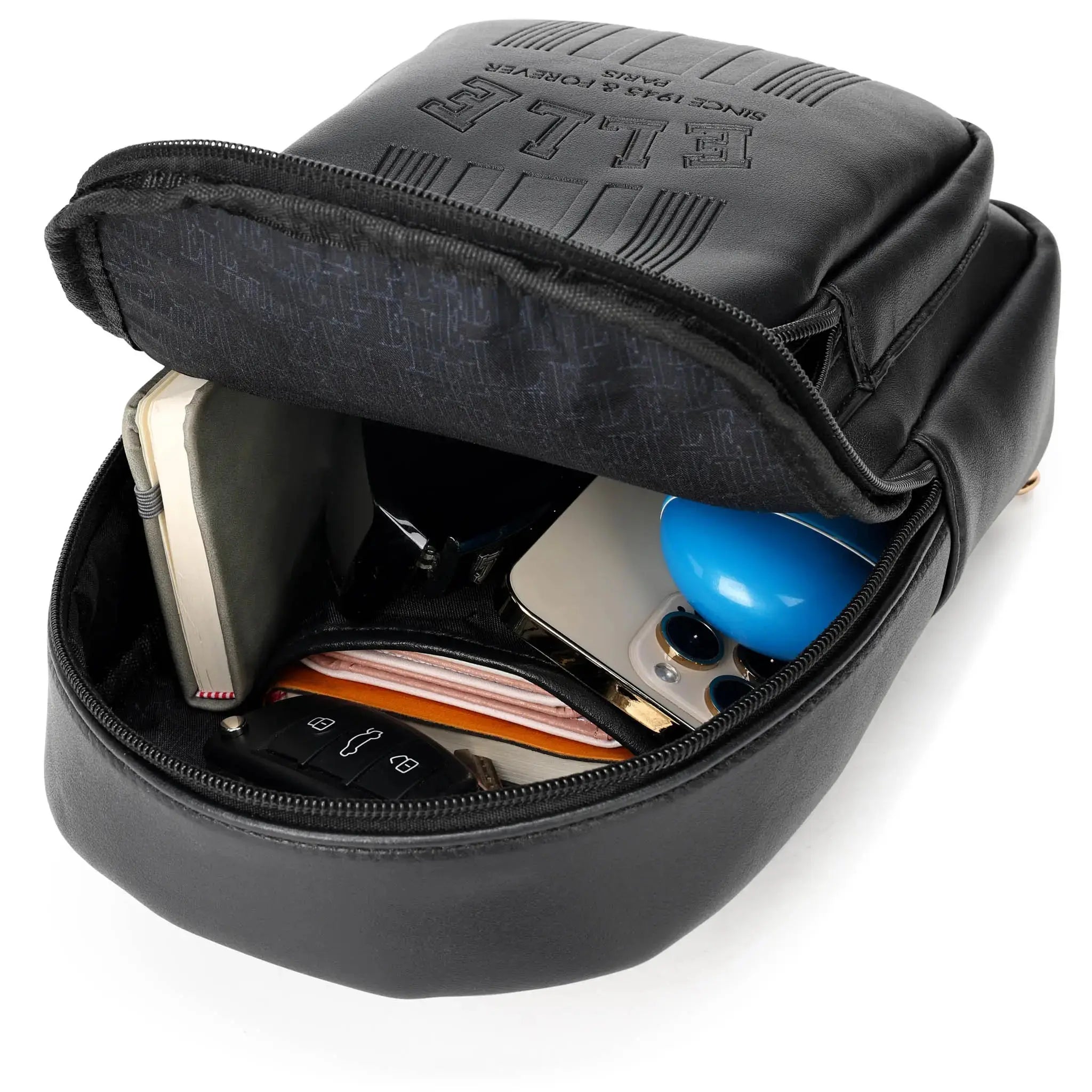 Black travel organizer with various items inside on a white background