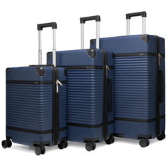 Set of three blue suitcases with black accents on a white background