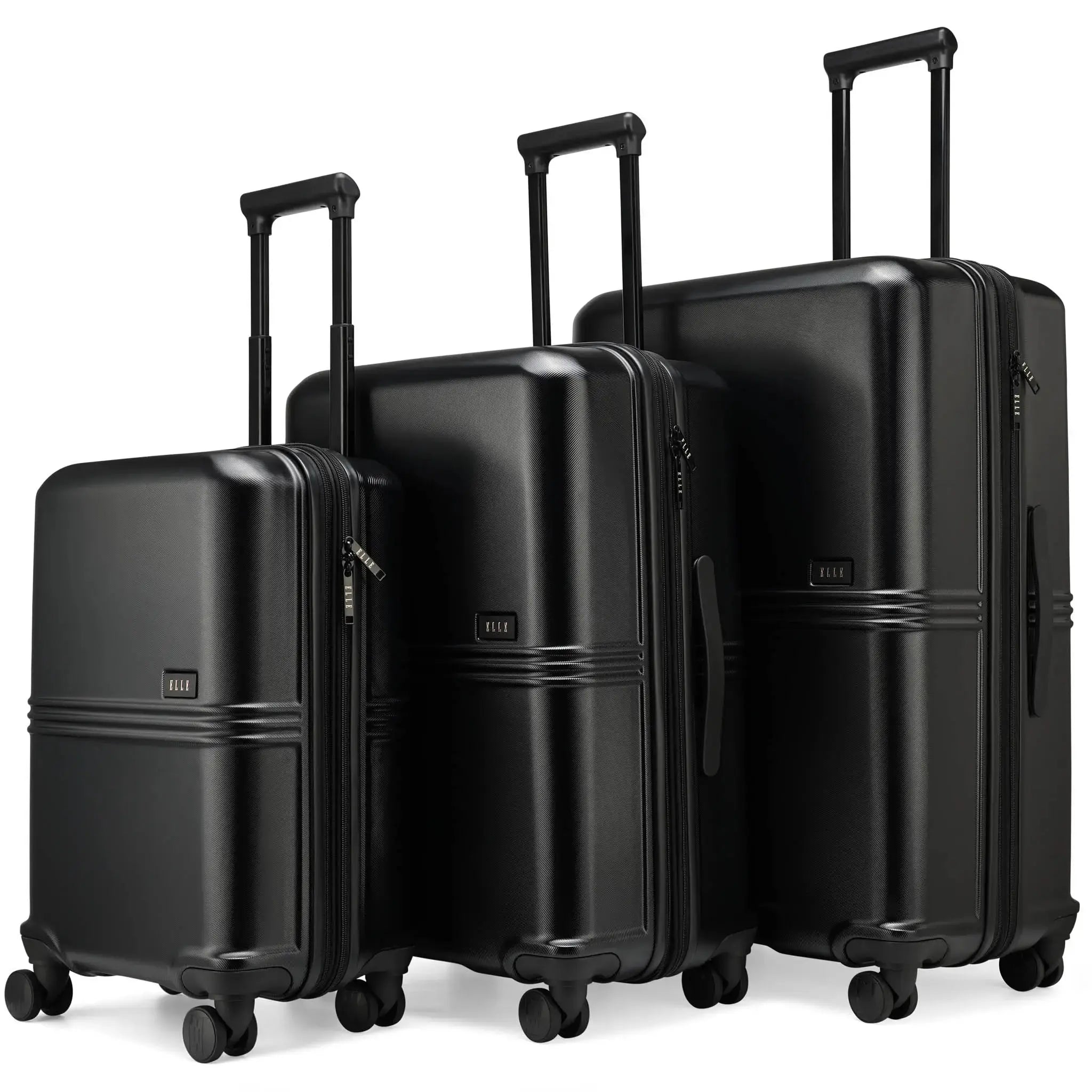 Set of three black suitcases of different sizes on a white background