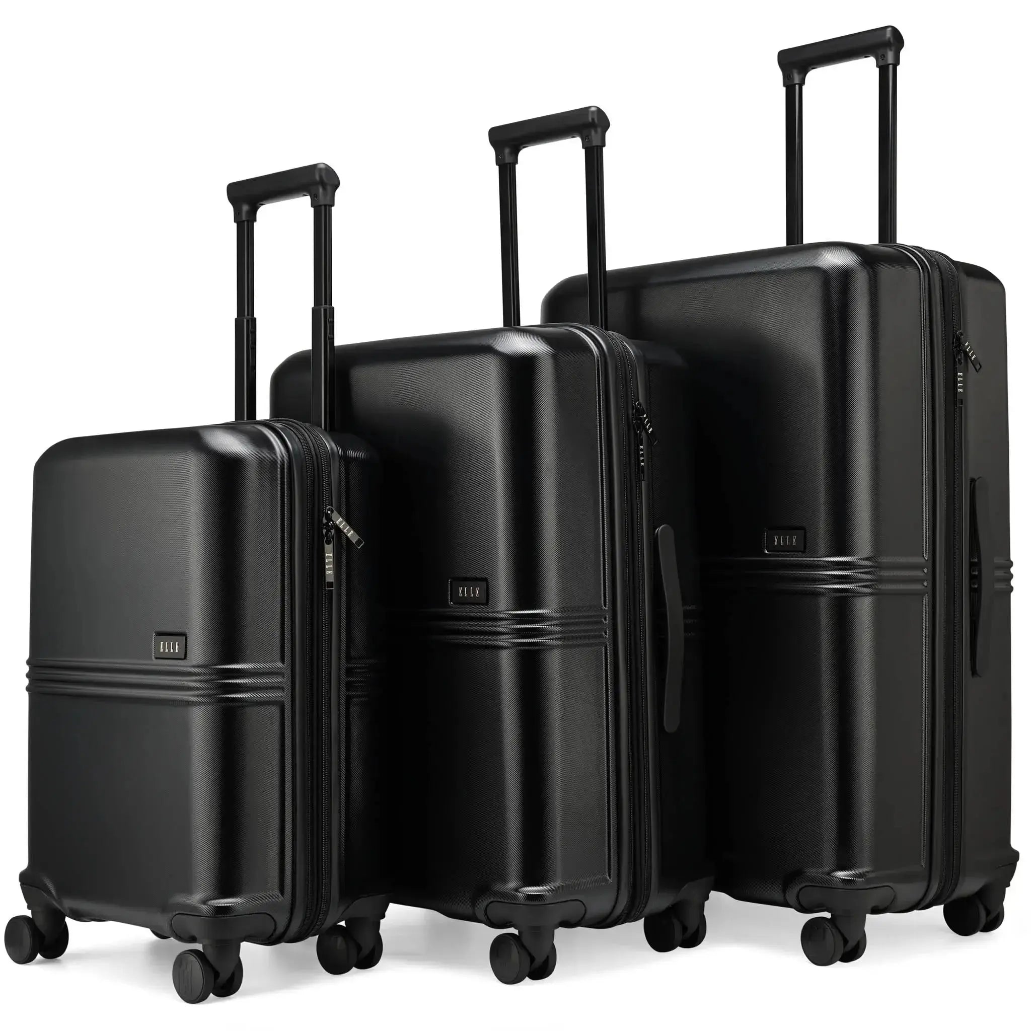 Set of three black suitcases of different sizes on a white background