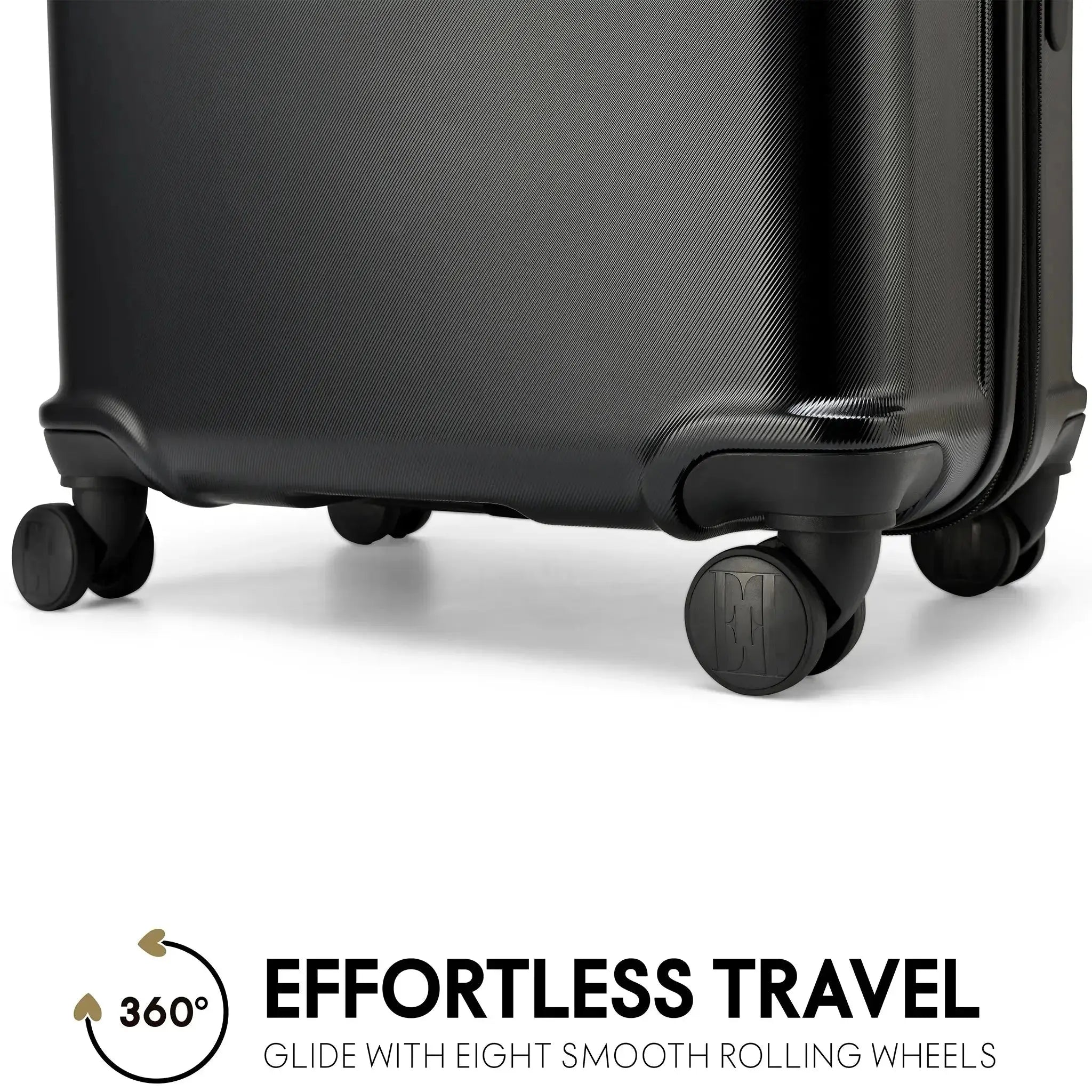 Black suitcase with wheels on a white background, featuring 'Effortless Travel' text.