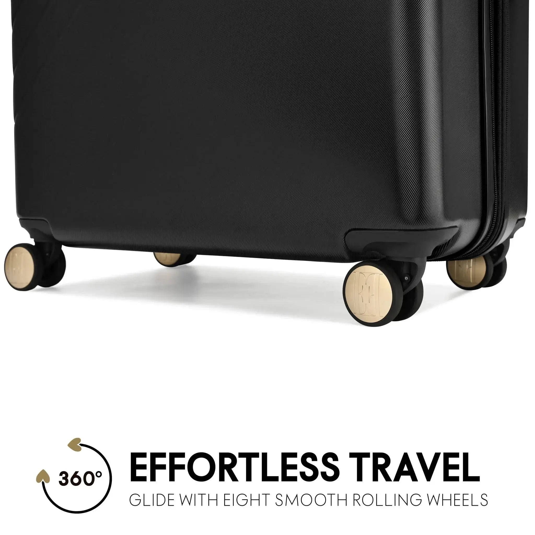 Black suitcase with eight smooth rolling wheels on a white background, featuring the text 'Effortless Travel'.