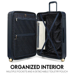 Open navy suitcase with organized interior features on a white background