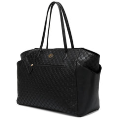 Black quilted handbag on a white background