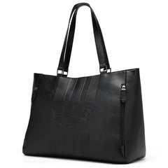 Black leather tote bag with a brand logo on a white background