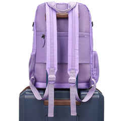 Purple backpack on a suitcase with a white background