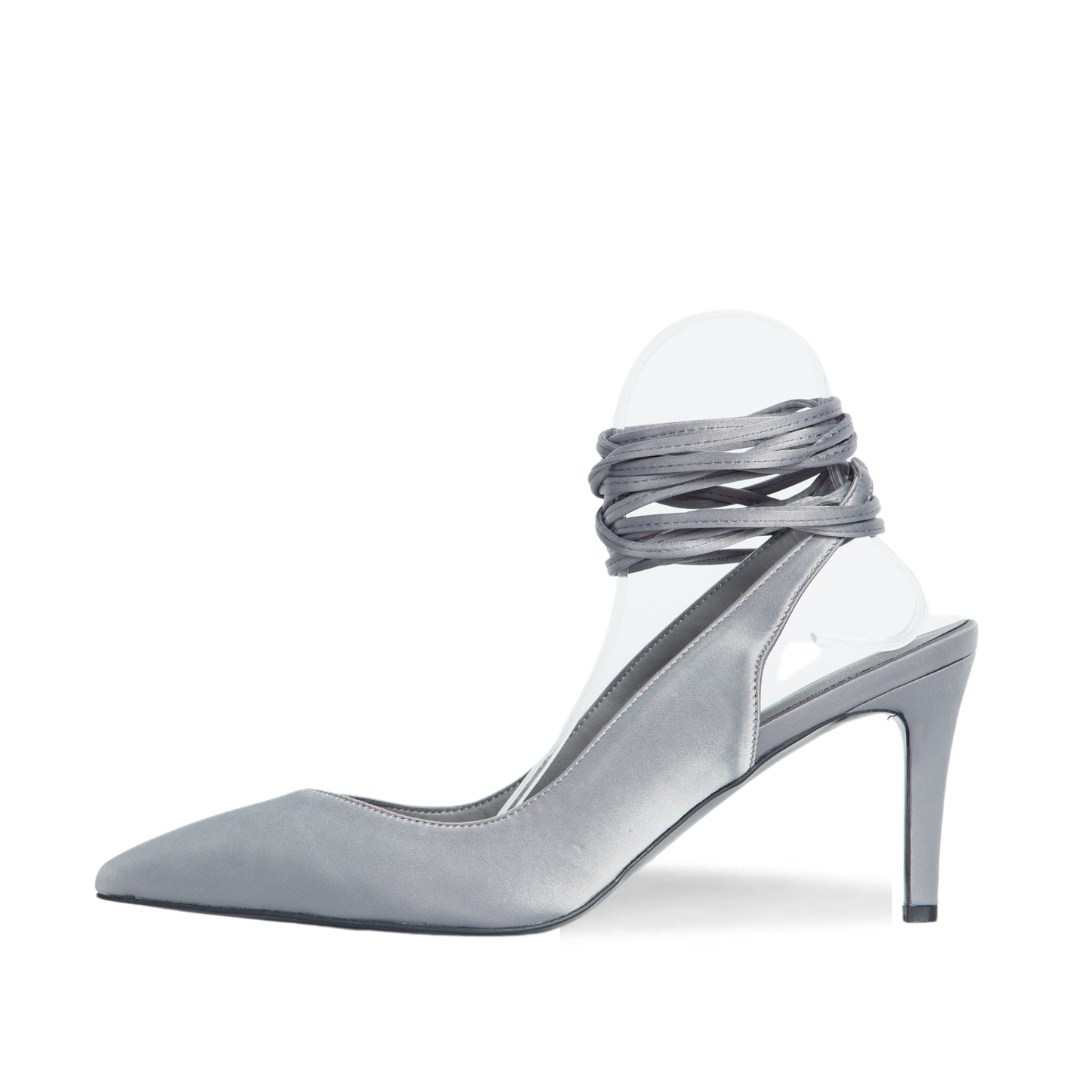 Gray high-heeled shoe with clear strap on a white background