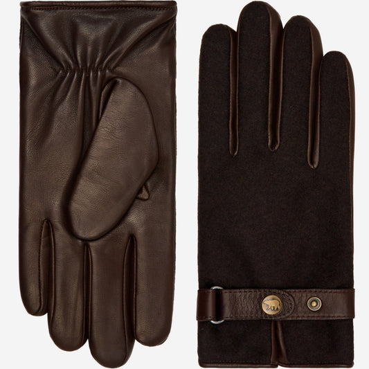 Pair of brown leather gloves with a button on a white background