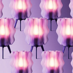 Pattern of purple and pink textured lamps on a matching background