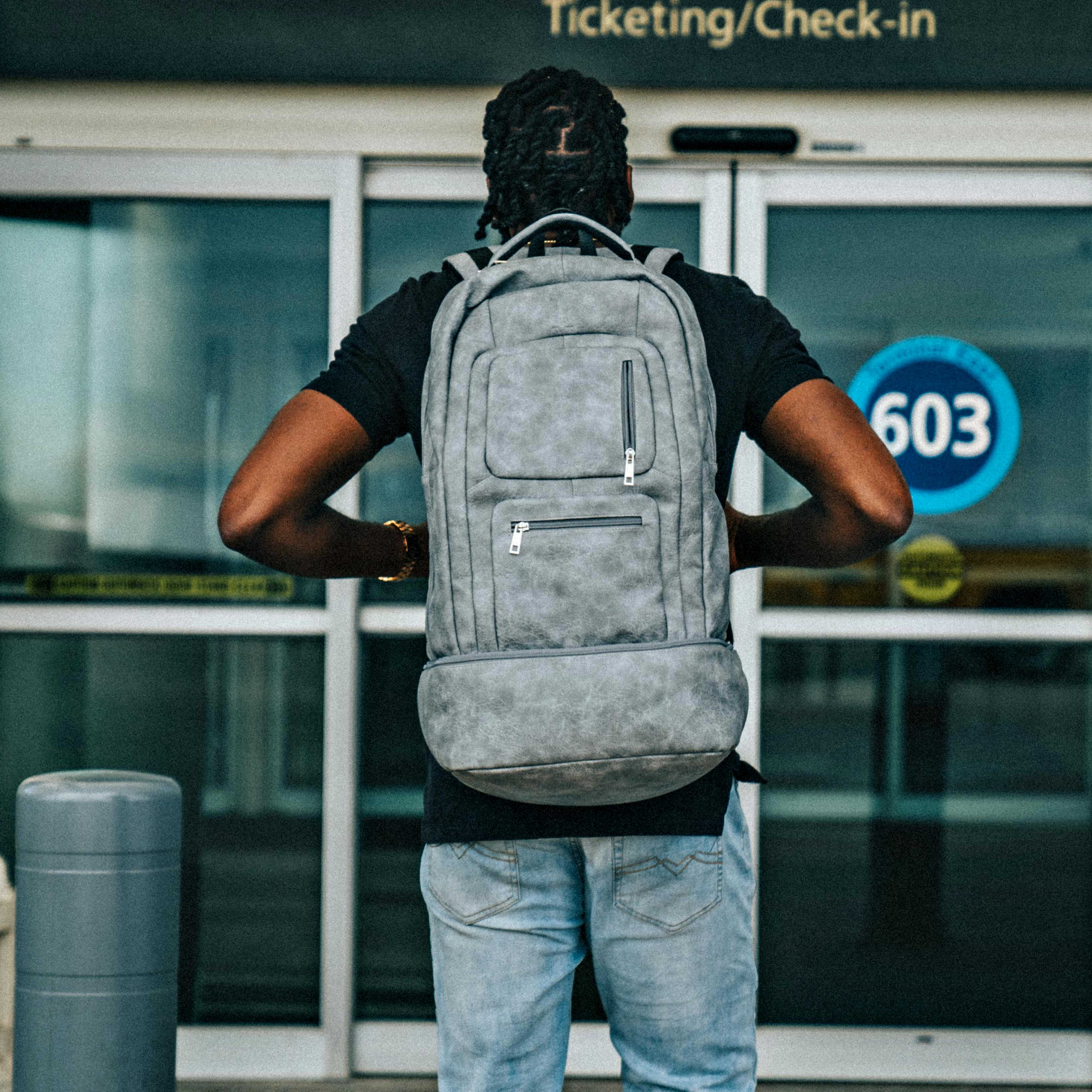 Grey Leather Carry-On Patented Backpack Sole Premise