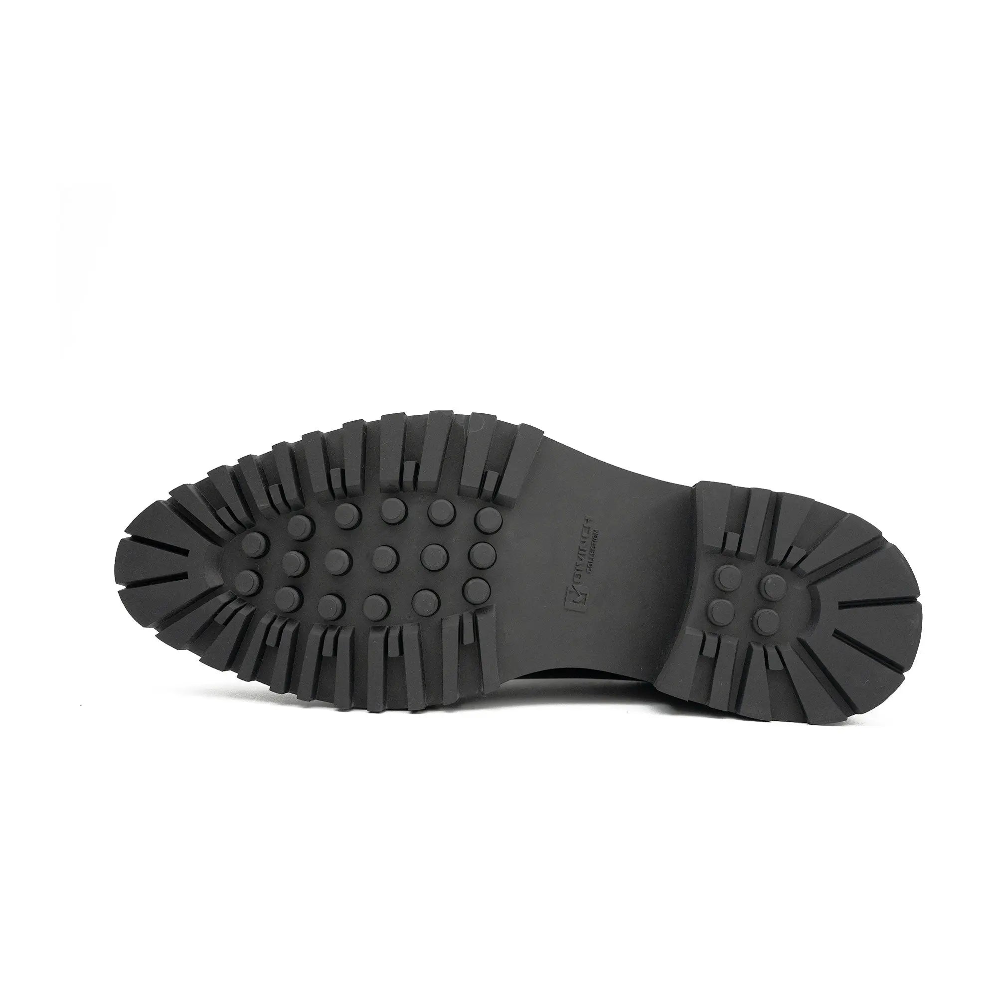 Black boot sole on a white background